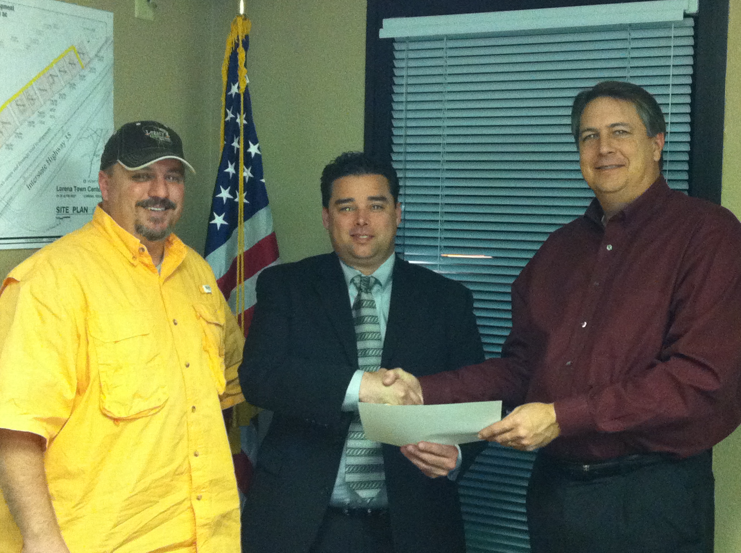 Lorena EDC awarding Rent Subsidy Grant Certificate to Matt Hodges.JPG